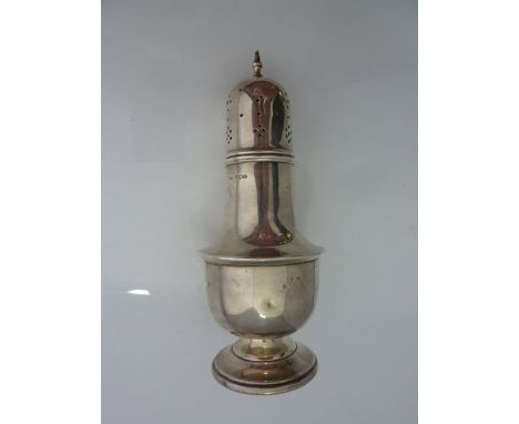 A George VI silver sugar caster, Viner's Ltd., Sheffield, 1945, the plain baluster body on a spreading stepped foot, the pier