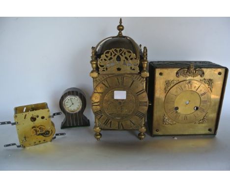 An old English style lantern clock case (no movement) of typical form, with engraved detail together with a small balloon sha