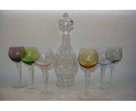 A good quality Waterford cut crystal club decanter with mushroom shaped stopper together with a harlequin set of six hock gla
