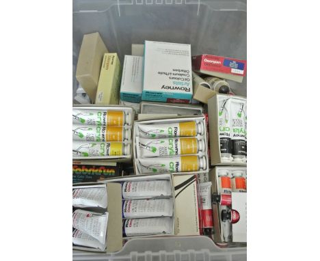 A quantity of artist's materials including a large and a small easel, sketch books, paint box, oil paints, acrylics, etc (fro