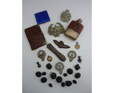 A silver and aligator skin mounted hip flask, a blue enamel compact case, a number of military lapel badges, etc