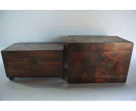 A good quality 19th century mahogany veneered tea caddy of rectangular form with flamed veneered front incorporating a pair o