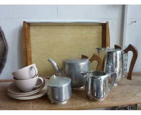 A Picquot  ware teapot, hot water pot and lidded sugar basin together with an associated milk jug and a further associated tr