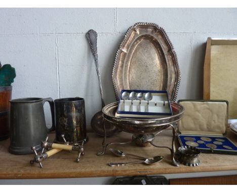 A silver plated serving dish of oval form raised on a stand with associated burner, a silver plated tray of oval form with a 
