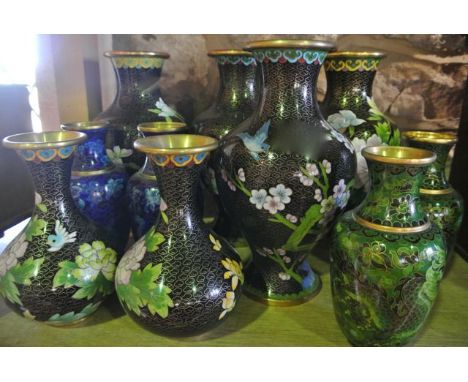 Five pairs of Chinese cloisonne enamel vases, all with flared rims with decoration in shades of dark blue, green, black and p