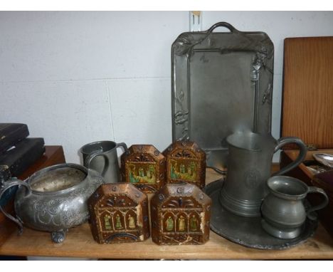 A selection of pewter wares to include a tankard stamped to underside London Aquinas Locke with further touch marks, a pewter