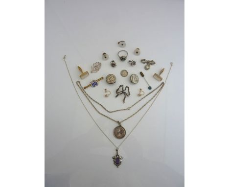 A pair of Victorian silver mounted cufflinks, each decorated with a bird; a gem-set pendant; a marcasite ribbon brooch; etc