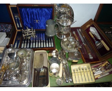 A collection of plated wares to include a good quality cased set of six knives and forks with mother of pearl handles and cha