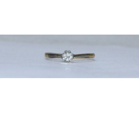 An 18ct and platinum solitaire diamond ring, eight platinum claw-set with a RBC diamond estimated total weight of 0.33cts, 2.