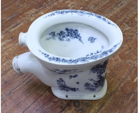 A 19th century ceramic toilet 'The Walmore' decorated throughout with a blue and white floral design. 41cm high.