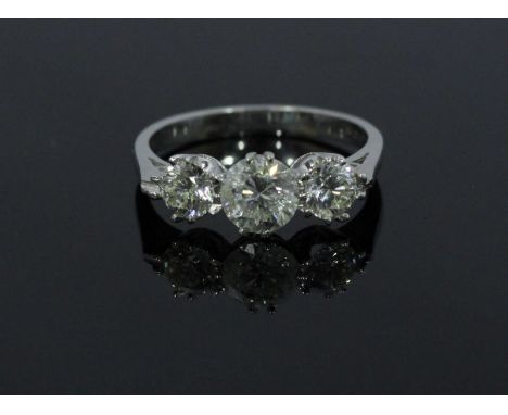 An 18ct white gold and three-stone diamond ring, claw-set RBC diamonds, estimated total diamond weight 1.85-1.95cts, 4.04g, r