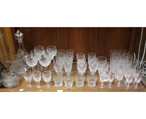 A good quantity of assorted cut glass items, including a Waterford decanter and a set of six wine glasses among other drinkin