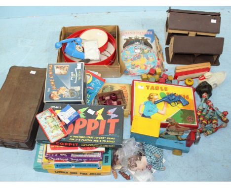 A quantity of 1950s toys and vintage Board games including a boxed 'Peak' Cine Projector, drum kit, farm buildings and painte