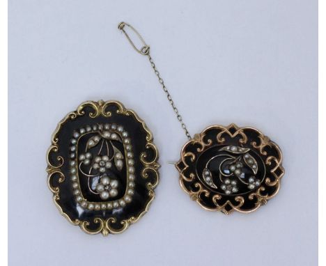 Two early Victorian yellow metal mourning brooches, each with scrollwork frame to a black enamel ground, floral design set wi