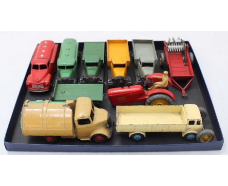 A Dinky Bedford Dustcart with winding tipper, two various Dinky petrol tankers (one blue, one green), three various Dinky fla