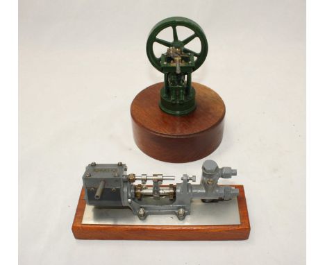 A well-engineered Stuart scale model feed pump, 16cm long, together with a scale model vertical oscillating engine, both moun