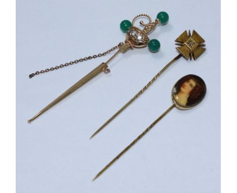 Three vintage stick pins comprising a diamond-set Maltese Cross, a sword and scabbard (both unmarked but testing as 15ct+, an