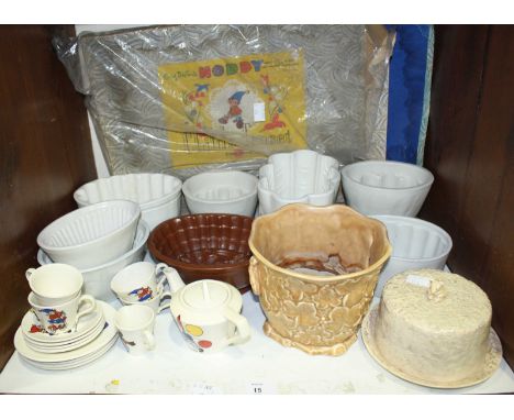 SECTION 15. Eight various ceramic jelly moulds, together with a Sylvac pottery cheese dish and cover and a small selection of