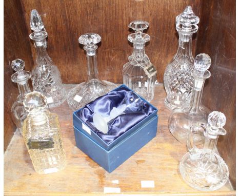SECTION 34.  A Waterford Crystal cut glass decanter and stopper, together with seven various decanters and a boxed Sasaki Cry