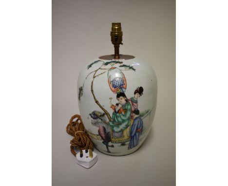 A Chinese famille rose ovoid jar,&nbsp;painted with figures and a mythical creature,&nbsp;the back with five columns of scrip