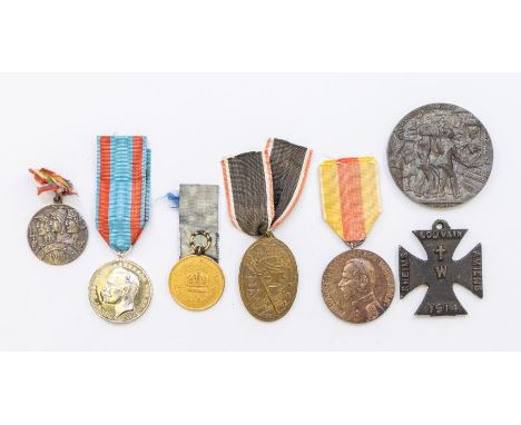 A selection of WWI and earlier military interest medals, to include: a British issued Lusitania Medallion; a British Iron Cro