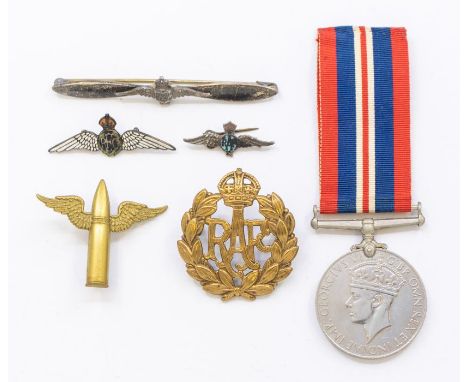 A selection of WWI and WWII aviation interest badges, to include: a WWI RFC silver and enamel sweetheart brooch (some wear to