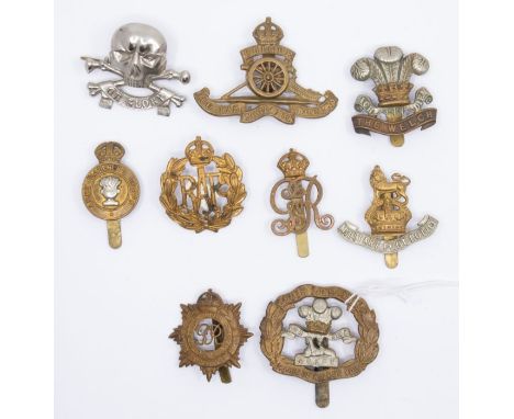 Small collection of Regimental and Corps badges to include; The Welch Regiment, South Lancashire, Royal Artillery, 17th/21st 