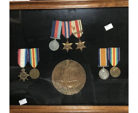 British medal groups in a frame, WW1 medals belonging to two brothers:- 76528 GNR J Gallagher of the Royal Field Artillery of