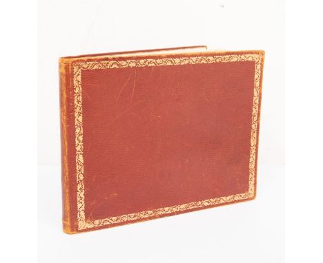 An important and virtually unique collection of signatures of Victoria Cross Winners.The tooled red leather album contains th