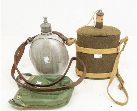 A WWII British Army water bottle with original webbing strap olive green cloth covering with cork stopper, together with an a