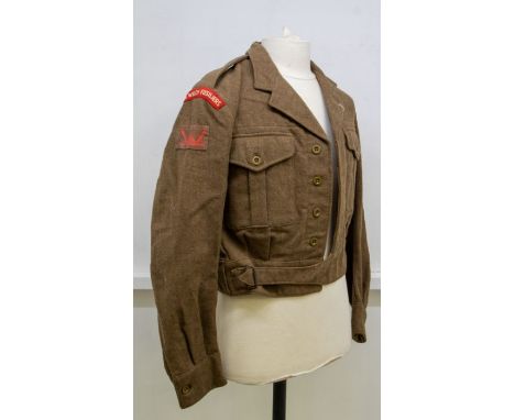 British 1949 pattern Battle Dress Blouse, issue dates of 1962 to the blouse, with cloth shoulder titles to the Royal Welsh Fu