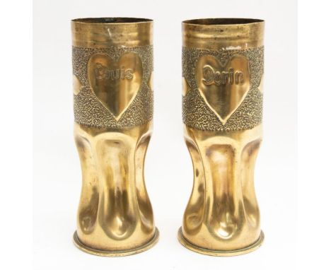 A nice match pair of WWI 1915 dated German shell cases, each has been worked with stippled decoration and are of wasted form,