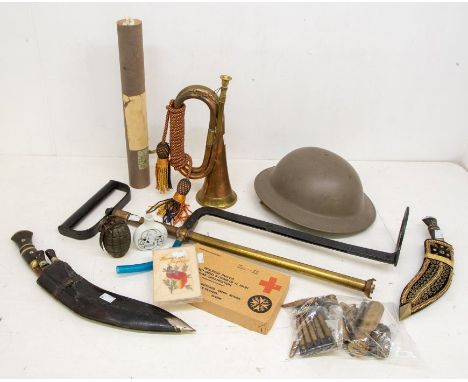 A mixed lot of militaria, to include: a Dutch-made copy of a British MkII infantry helmet - issued to Dutch Civil Defence Uni