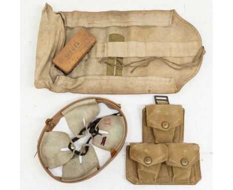 A British WWII era triple ammunition pouch 1937 pattern, in tab webbing, 1940 dated inside, together with a pre WWII 1925 dat