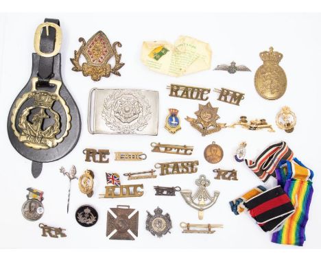 A selection of military / royal family related badges, shoulder titles, buckles, medallions etc.Including: silver sweetheart 