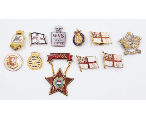 A collection of enamel badges, including two British post WWII Civil Defence badges, three EX RN &amp; RM Member badges, a RN