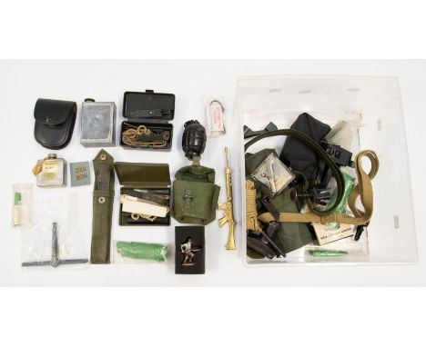 A large selection of various military related tools, spares, Insignia, webbing straps, oil bottles, a dummy Mills grenade, va