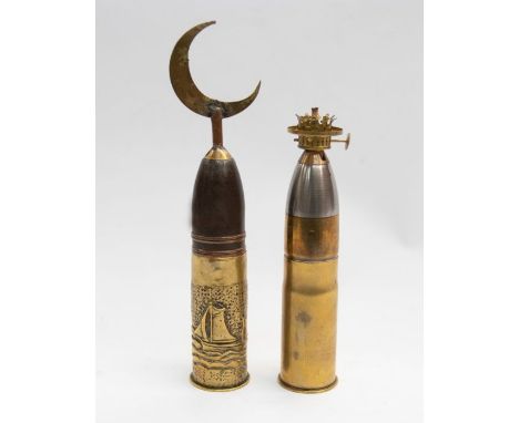 An unusual WWI era French 37mm trench art shell case, dated Sept 1917, with hand hammered sailing ship decoration, the projec