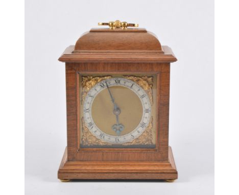 Rotherham mantel clock, gilt spandrels, mahogany case, height 19cm.