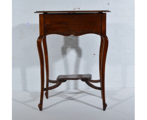 Edwardian mahogany metamorphic writing table, rectangular serpentine top enclosing a fitted interior with writing surface, ca