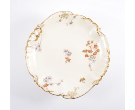 Five Continental porcelain dessert stands, floral design on a cream ground, together with a cut glass ships decanter and a sa