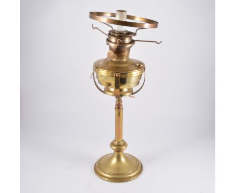 Brass oil lamp converted to electric, other lamps and wall shelf brackets.