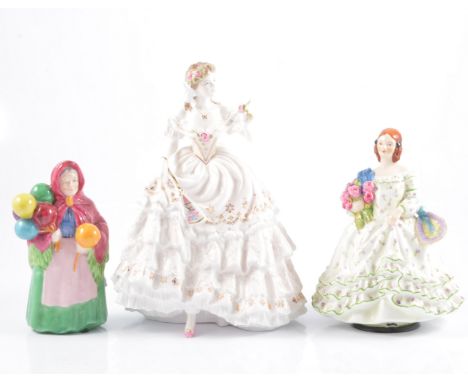 Two Royal Worcester figures, 'June' and 'The Fairest Rose', together with a Goss figure 'Balloon Seller'  (3).