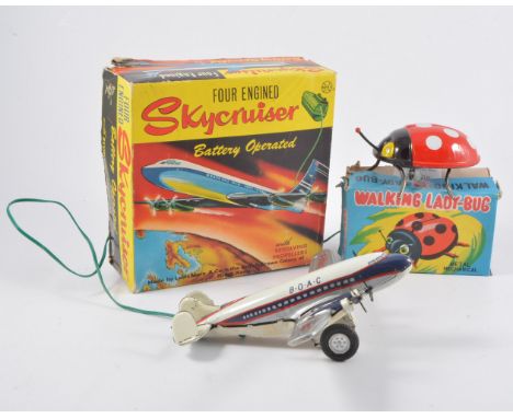 Marx toys tin-plate bi-plane, along with a K toys ladybird toy made in Japan, both boxed (2).
