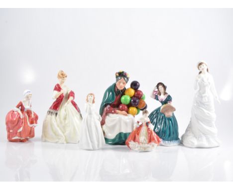 Royal Worcester figure, First Dance; five Royal Doulton ladies; and a Coalport lady. (7)