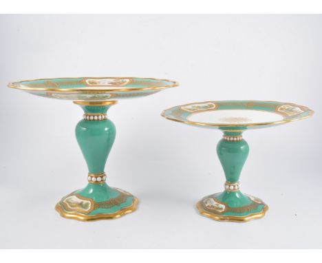 Victorian Staffordshire part dessert service, wavy outlines with green borders painted with landscape cartouches, central gil