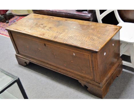 Italian inlaid walnut coffer, rectangular hinged lid, bracket feet, width 142cm, depth 50cm, height 62cm.