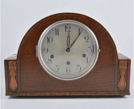 Oak three train mantel clock, glass dome.