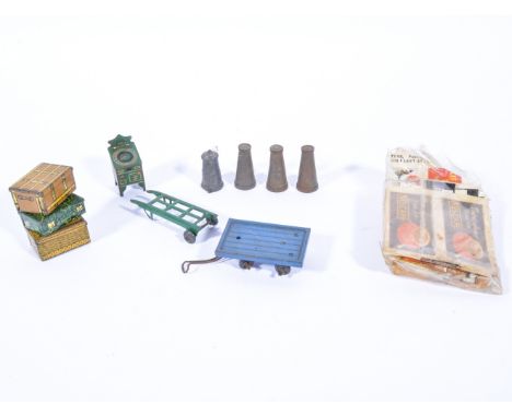 1930s Hornby tin-plate railway accessories, luggage with trolleys, along with platform machine, milk churns, advertising deca