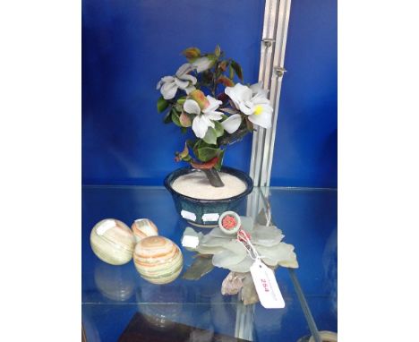 A JADE TREE, a similar flower and three onyx eggs